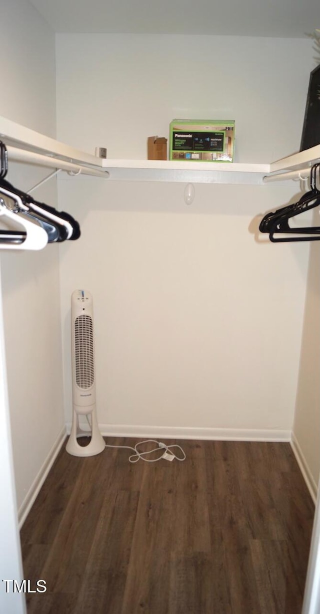 80 Stoneridge Rd, Durham, NC 27705 - walk in closet with dark wood-style flooring