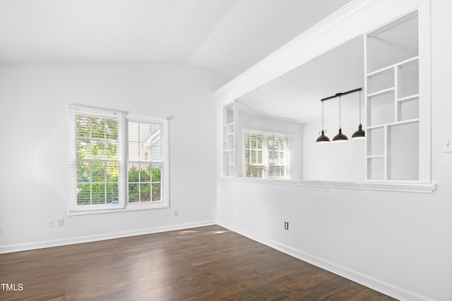 613 Penncross Dr, Raleigh, NC 27610 - unfurnished room featuring dark wood-style flooring and vaulted ceiling