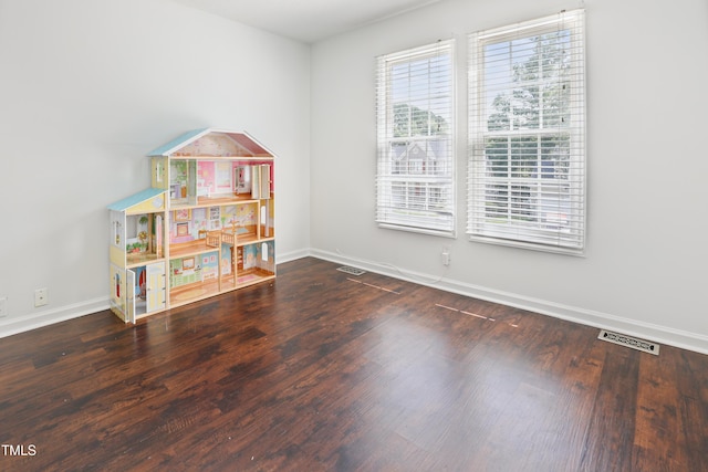 613 Penncross Dr, Raleigh, NC 27610 - game room with wood finished floors and baseboards