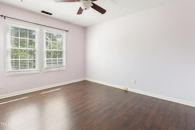 613 Penncross Dr, Raleigh, NC 27610 - spare room with a ceiling fan and dark wood finished floors