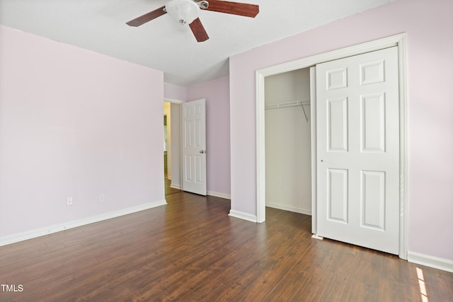 613 Penncross Dr, Raleigh, NC 27610 - unfurnished bedroom featuring dark wood-type flooring, a closet, and ceiling fan