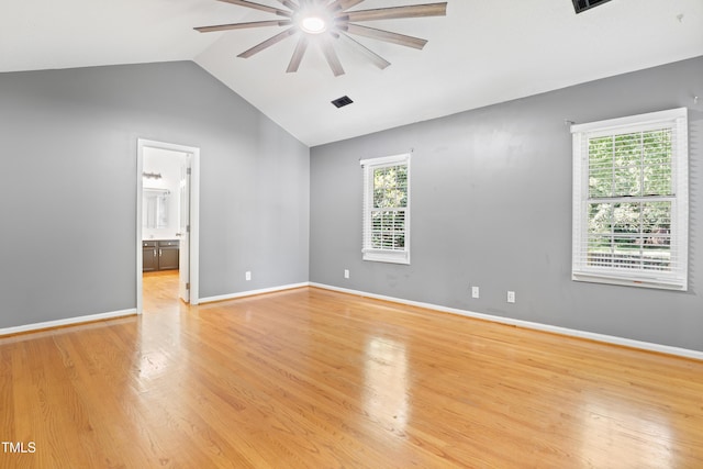 613 Penncross Dr, Raleigh, NC 27610 - unfurnished room featuring a ceiling fan, plenty of natural light, light wood-type flooring, and high vaulted ceiling