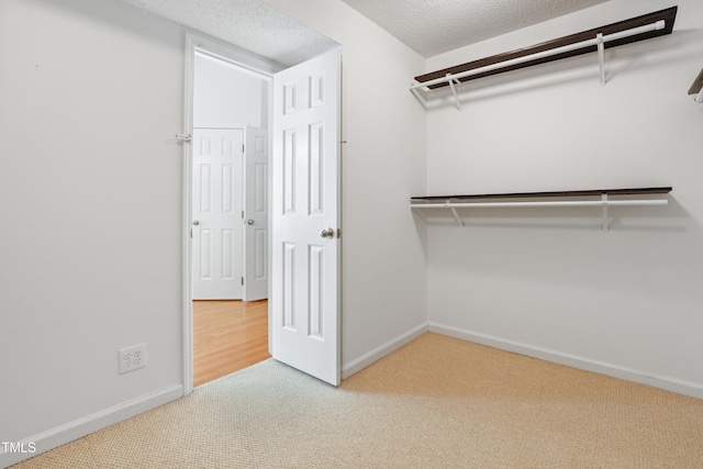 613 Penncross Dr, Raleigh, NC 27610 - walk in closet with carpet floors