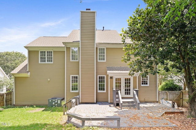 613 Penncross Dr, Raleigh, NC 27610 - rear view of property with french doors, a wooden deck, a chimney, and a shingled roof