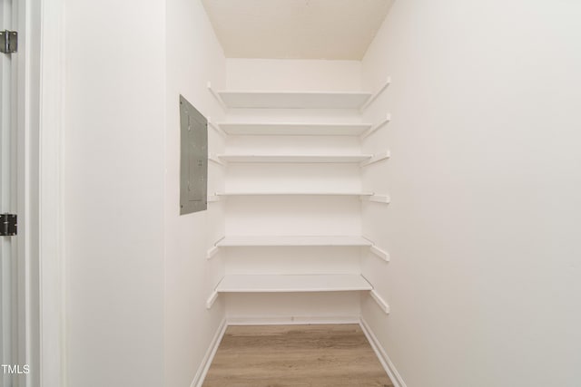 4258 Kaplan Dr, Raleigh, NC 27606 - spacious closet featuring light wood finished floors and electric panel