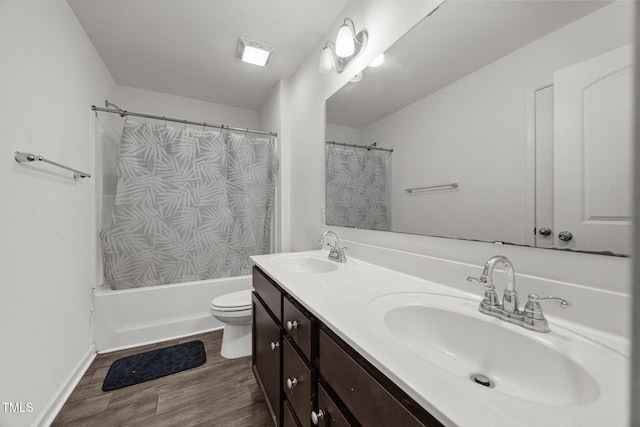 2021 W Front St, Burlington, NC 27215 - bathroom featuring wood finished floors, double vanity, and shower / bath combination with curtain