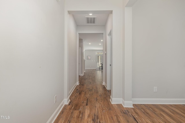 1127 Timbercut Dr, Durham, NC 27703 - hall featuring wood finished floors and recessed lighting