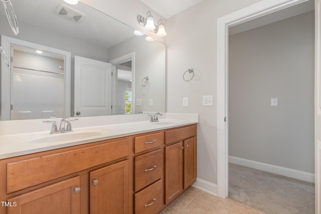 1127 Timbercut Dr, Durham, NC 27703 - full bathroom featuring double vanity and tile patterned flooring