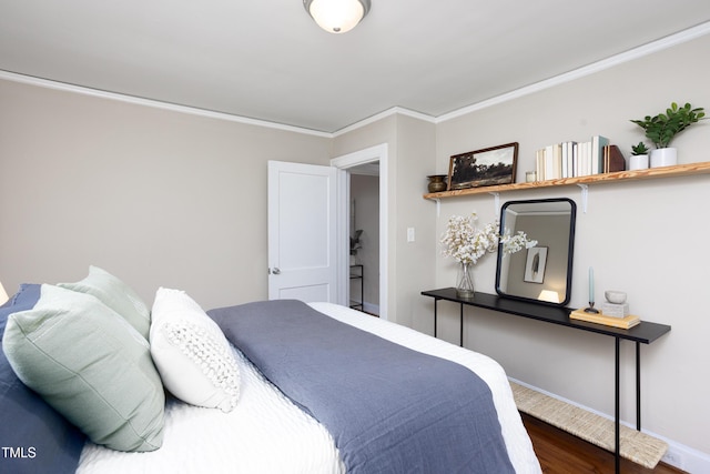 2423 Farthing St, Durham, NC 27704 - bedroom featuring wood finished floors and crown molding