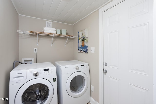2423 Farthing St, Durham, NC 27704 - laundry area with washer and clothes dryer and ornamental molding