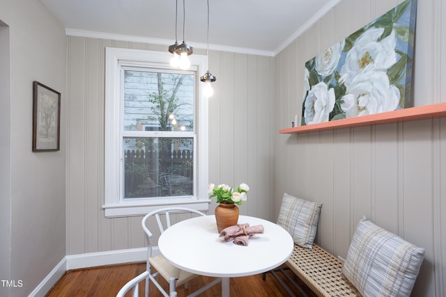 2423 Farthing St, Durham, NC 27704 - dining space featuring crown molding and wood finished floors