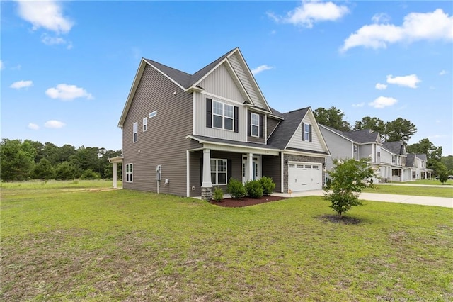 3902 Standardbred Dr, Hope Mills, NC 28348 - craftsman-style home with concrete driveway, covered porch, a front yard, and board and batten siding
