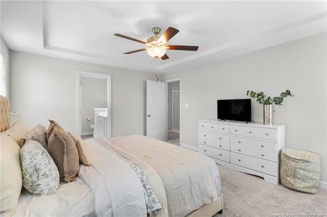 3902 Standardbred Dr, Hope Mills, NC 28348 - bedroom with carpet floors, ceiling fan, ensuite bath, and a raised ceiling