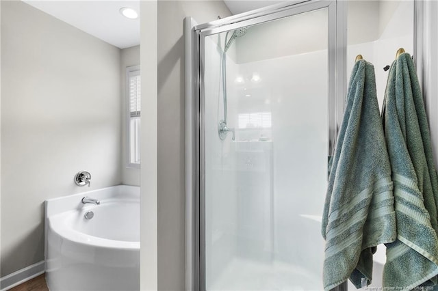 3902 Standardbred Dr, Hope Mills, NC 28348 - bathroom featuring a stall shower and a garden tub