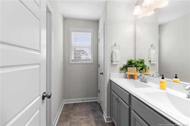 3902 Standardbred Dr, Hope Mills, NC 28348 - bathroom with double vanity and baseboards