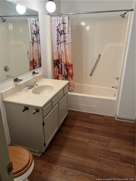 5200 Pineview Rd, Lumberton, NC 28360 - bathroom with wood finished floors, vanity, and shower / tub combo with curtain