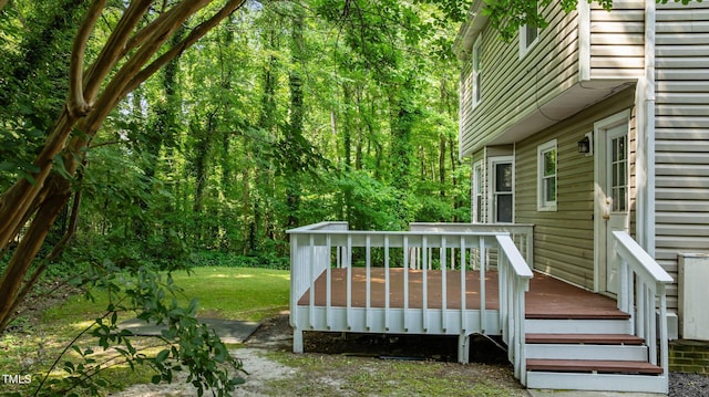 113 Fox Run, Henderson, NC 27536 - wooden terrace featuring a view of trees and a yard