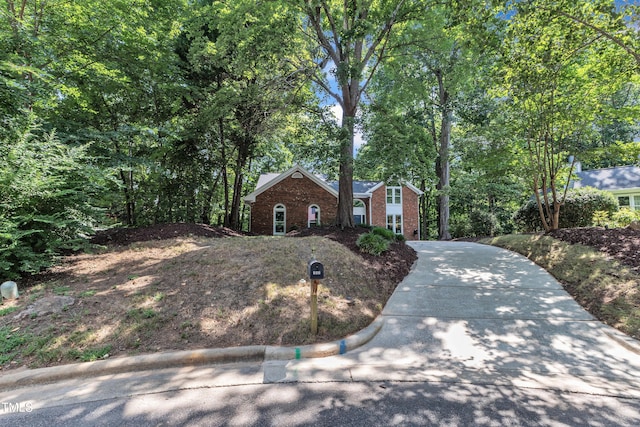 103 Javelin Ct, Cary, NC 27513 - view of front facade featuring brick siding and driveway