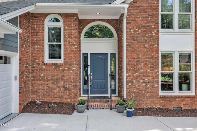 103 Javelin Ct, Cary, NC 27513 - property entrance with brick siding and roof with shingles