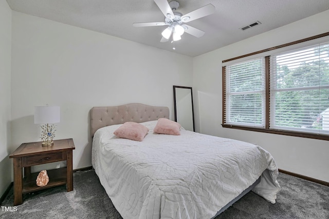 6701 Winding Trl, Raleigh, NC 27612 - carpeted bedroom featuring baseboards and ceiling fan