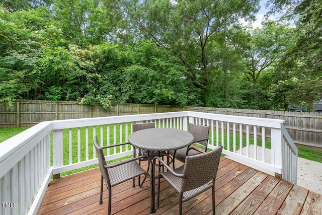 1920 Hart St, Durham, NC 27703 - wooden terrace with outdoor dining space and a fenced backyard