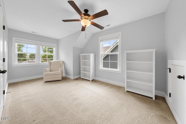 1920 Hart St, Durham, NC 27703 - living area with ceiling fan, carpet flooring, and vaulted ceiling