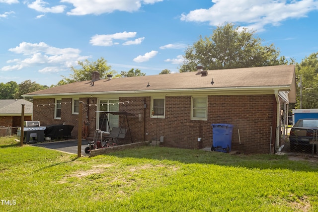 2037 Mango Cir, Fayetteville, NC 28304 - back of house with a patio and brick siding