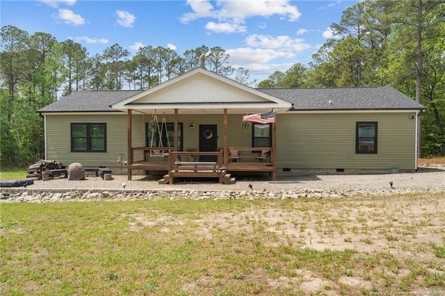 588 Heritage Farm Rd, Carthage, NC 28327 - rear view of property featuring crawl space, covered porch, roof with shingles, and a yard