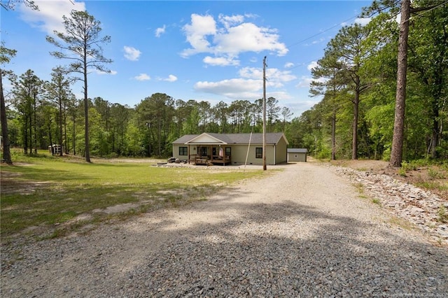 588 Heritage Farm Rd, Carthage, NC 28327 - view of front of property featuring driveway and a wooded view