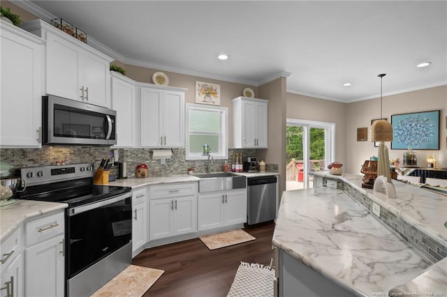 588 Heritage Farm Rd, Carthage, NC 28327 - kitchen with appliances with stainless steel finishes, dark wood-type flooring, white cabinetry, recessed lighting, and decorative backsplash