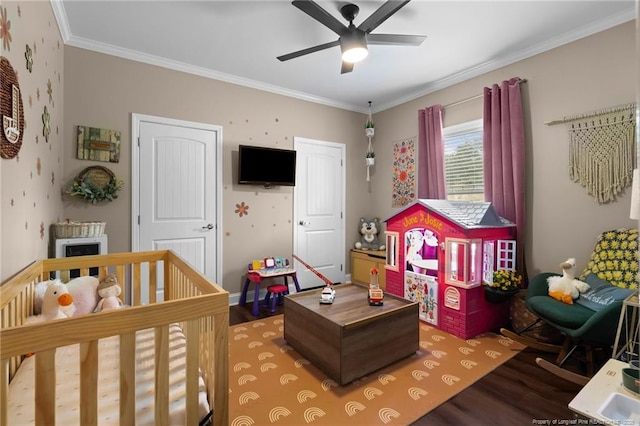 588 Heritage Farm Rd, Carthage, NC 28327 - bedroom with wood finished floors, crown molding, and a nursery area