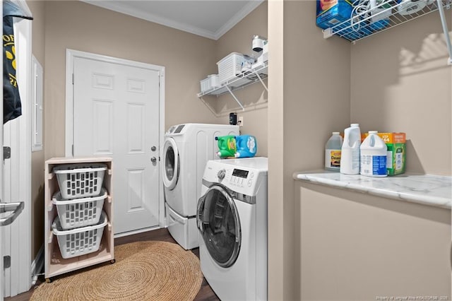 588 Heritage Farm Rd, Carthage, NC 28327 - laundry room with crown molding, separate washer and dryer, and wood finished floors