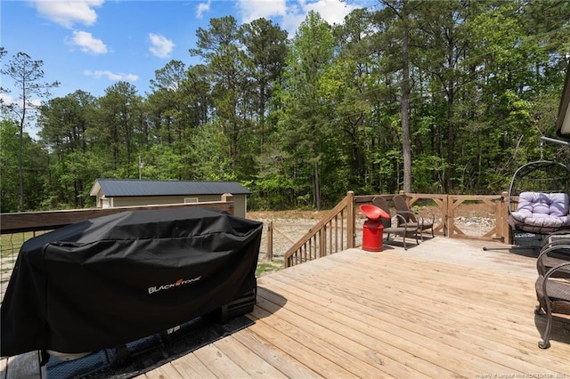588 Heritage Farm Rd, Carthage, NC 28327 - wooden deck featuring grilling area and a wooded view