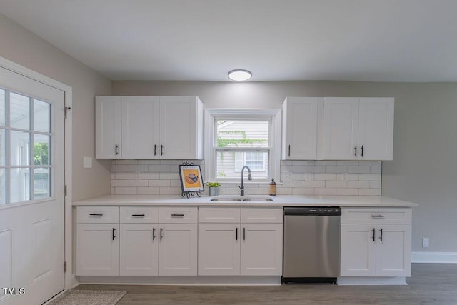 1708 Forest Rd, Durham, NC 27705 - kitchen featuring dishwasher, light wood-style flooring, and white cabinets