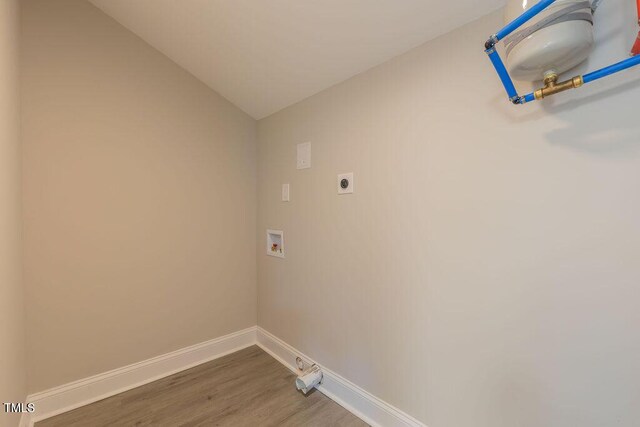 1708 Forest Rd, Durham, NC 27705 - laundry room with hookup for an electric dryer, hookup for a washing machine, and wood finished floors