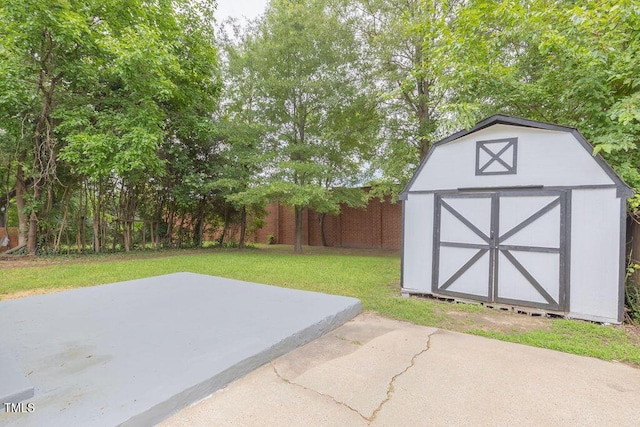 1708 Forest Rd, Durham, NC 27705 - view of patio with a storage unit