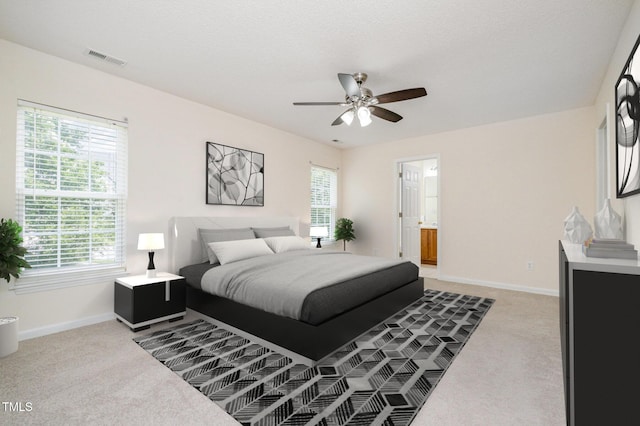 2241 Spruce Shadows Ln, Raleigh, NC 27614 - bedroom featuring light colored carpet, ensuite bathroom, and ceiling fan