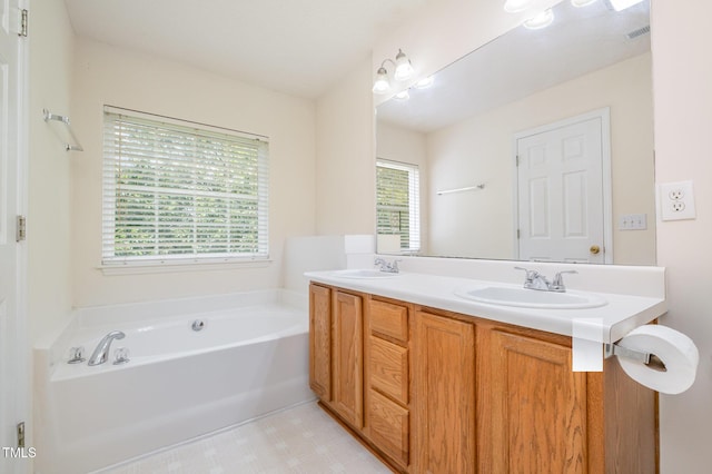 2241 Spruce Shadows Ln, Raleigh, NC 27614 - full bath featuring a bath and double vanity