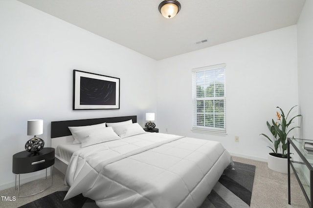 2241 Spruce Shadows Ln, Raleigh, NC 27614 - carpeted bedroom featuring baseboards
