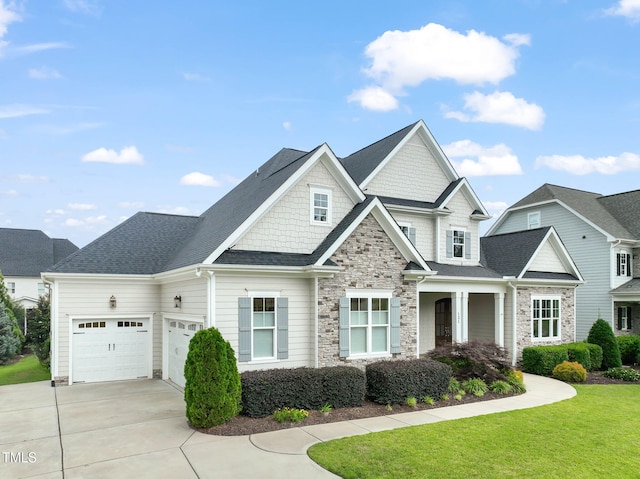 121 Hardy Oaks Way, Holly Springs, NC 27540 - craftsman inspired home with concrete driveway, stone siding, an attached garage, and a front yard