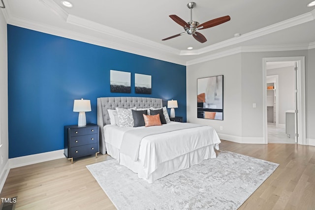 121 Hardy Oaks Way, Holly Springs, NC 27540 - bedroom with a raised ceiling, wood finished floors, crown molding, recessed lighting, and a ceiling fan