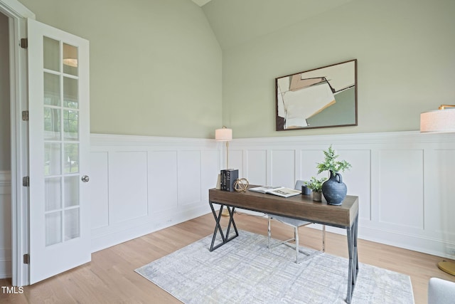 121 Hardy Oaks Way, Holly Springs, NC 27540 - office area with a decorative wall, wood finished floors, lofted ceiling, and wainscoting