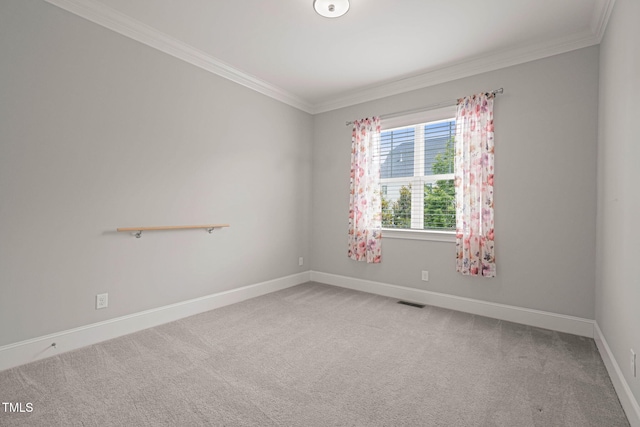 121 Hardy Oaks Way, Holly Springs, NC 27540 - spare room featuring crown molding and light colored carpet