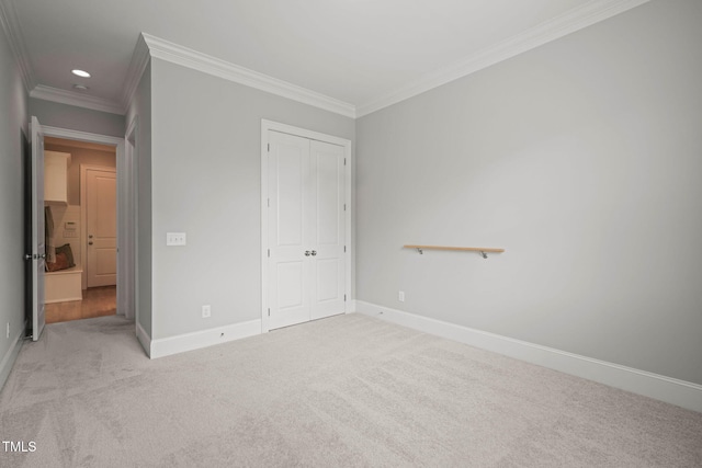 121 Hardy Oaks Way, Holly Springs, NC 27540 - unfurnished bedroom featuring light carpet, crown molding, a closet, and recessed lighting