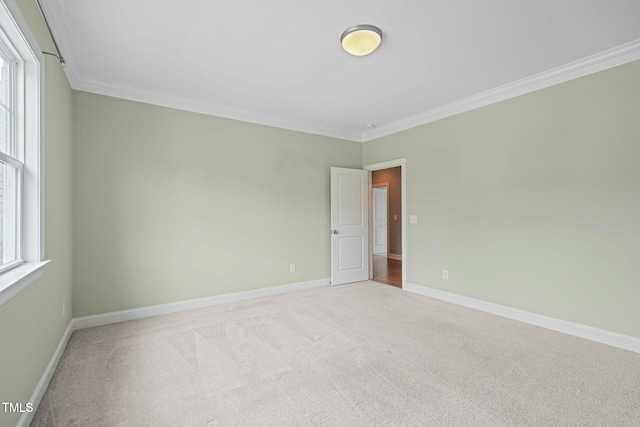 121 Hardy Oaks Way, Holly Springs, NC 27540 - unfurnished room with crown molding and light carpet