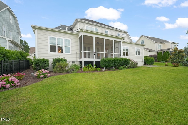 121 Hardy Oaks Way, Holly Springs, NC 27540 - back of property featuring a sunroom and ceiling fan