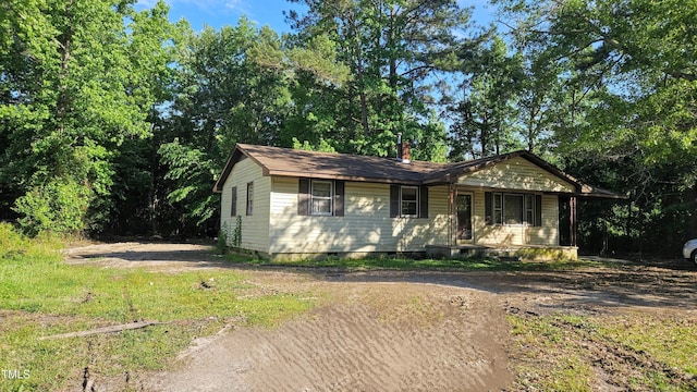 2100 N Webb St, Selma, NC 27576 - single story home featuring covered porch, crawl space, and a chimney