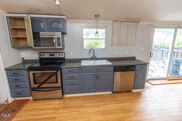 269 Beagle Run Ln, Aberdeen, NC 28315 - kitchen featuring appliances with stainless steel finishes, dark countertops, and gray cabinetry