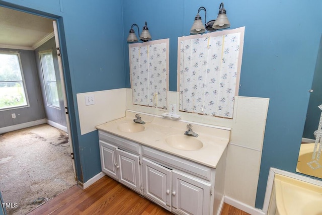 269 Beagle Run Ln, Aberdeen, NC 28315 - full bath with ornamental molding, double vanity, and wood finished floors