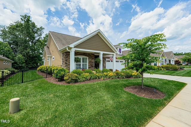 514 Ashley Woods Dr, Gibsonville, NC 27249 - view of front of house with stone siding and a shingled roof